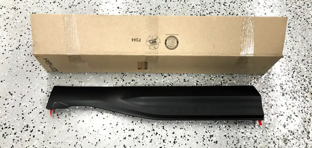 Nissan Rear LH Door Lower Molding 82877-65A0A NOS